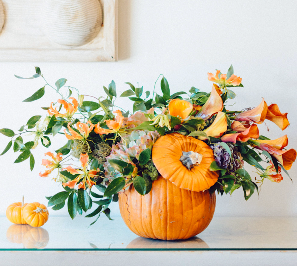 pumpkin-shaped halloween flower pots - flowers