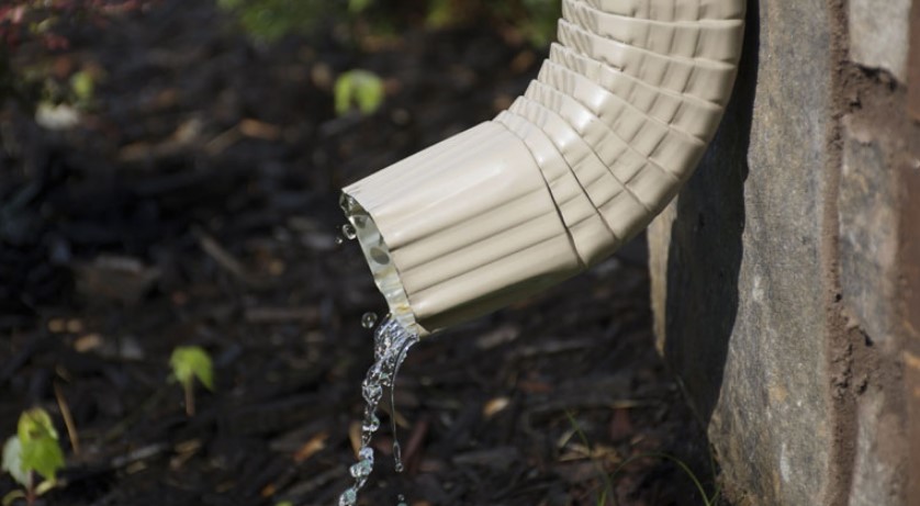 Water flows smoothly from the downspout