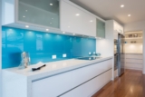 Shimmering Surfaces: The Beauty of Glass Kitchen Splashbacks