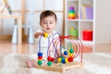 When Do Babies Start Playing with Toys: Insights into Infant Play & Learning