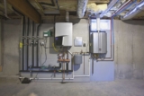 Where Can I Find Rebates on Tankless Water Heaters Installed By American Home Water & Air in Phoenix?
